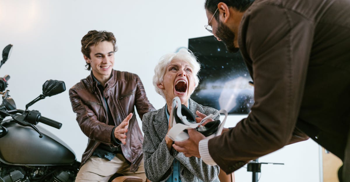 an excited senior woman experiencing virtual reality with the help of two young men indoors