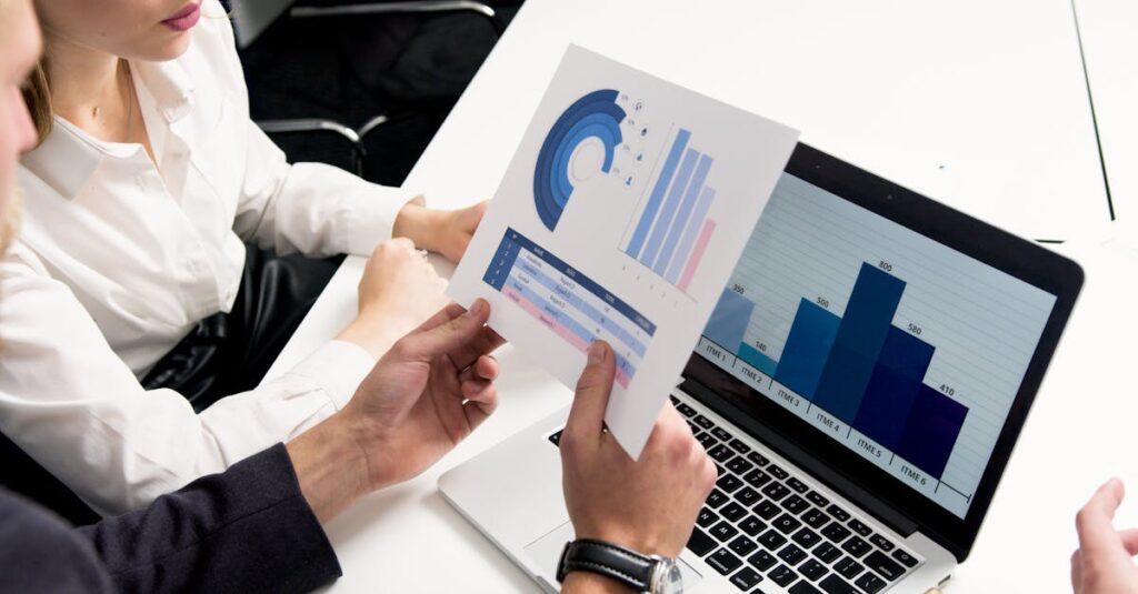 business professionals discussing data charts and graphs in a modern office setting 2