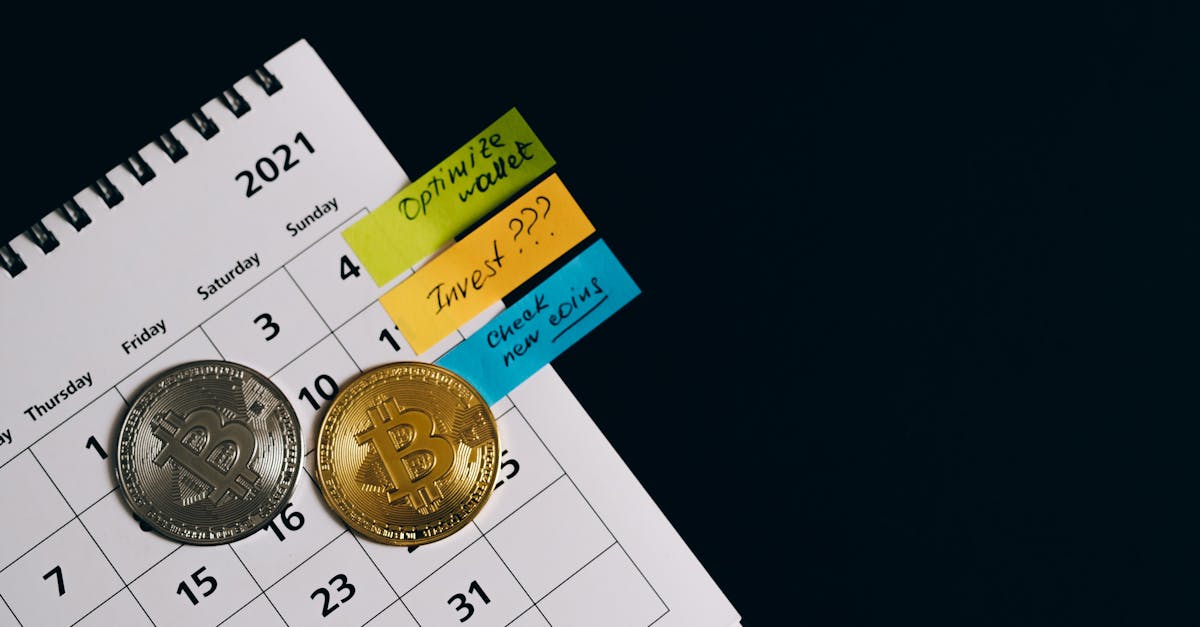 close up of bitcoins on a calendar highlighting investment plans with sticky notes