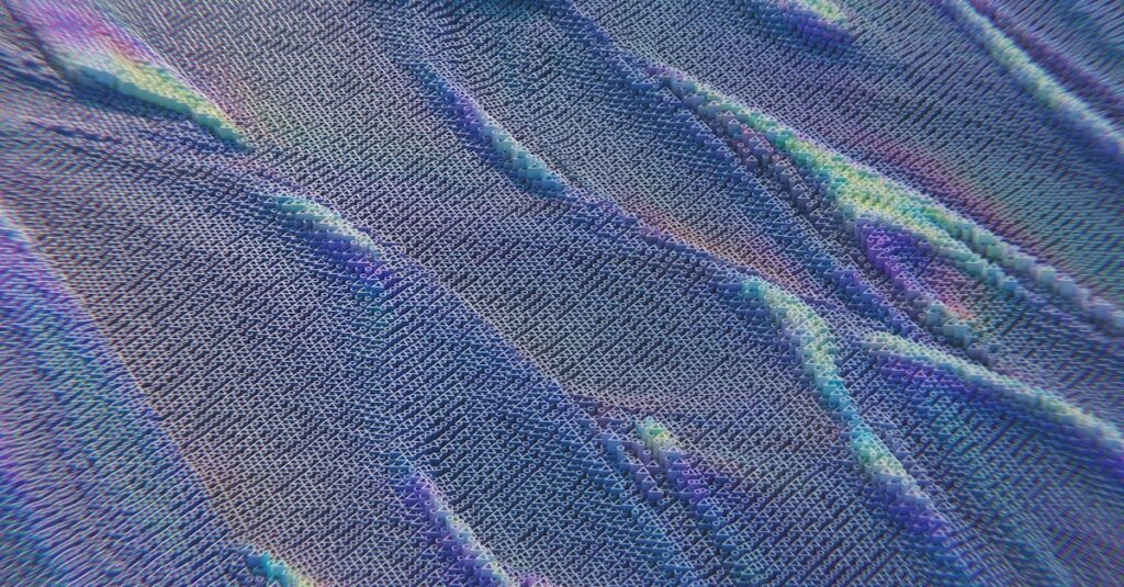 colorful abstract pattern resembling digital waves with intricate texture in blue and purple hues